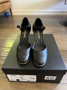 CHANEL Black Leather Ankle-Strap Pumps with Gold Accent